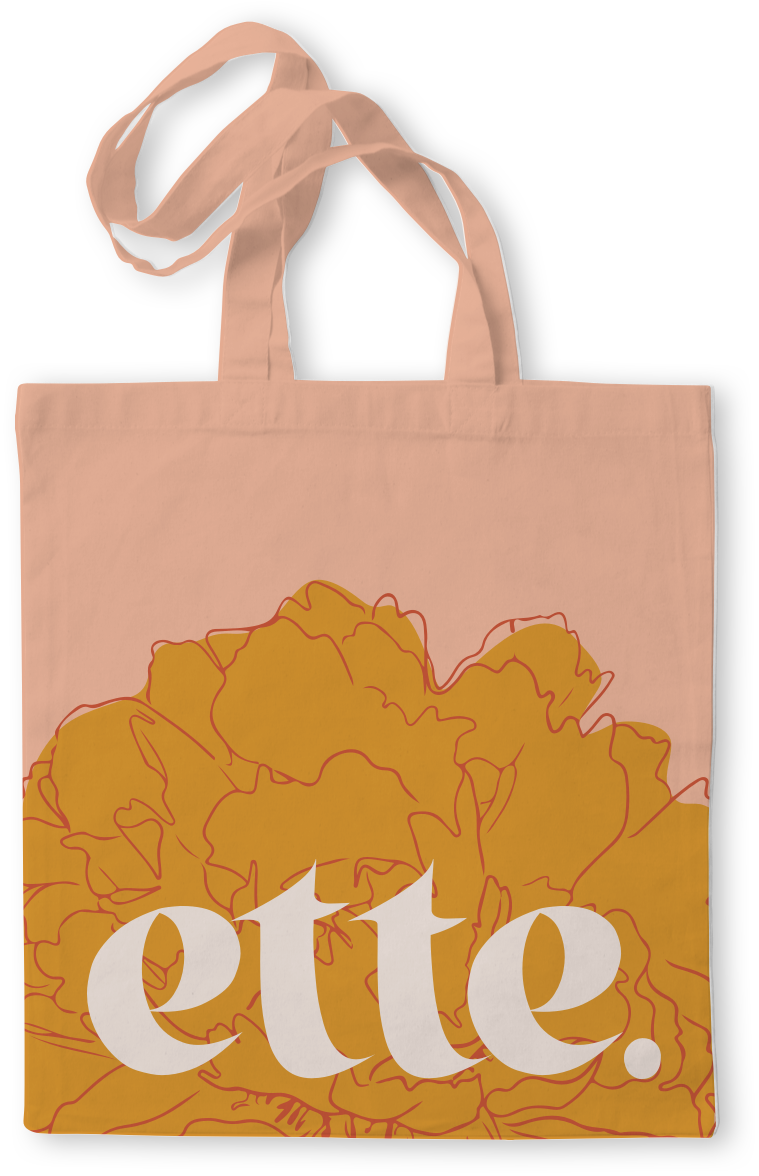 tote bag in pink with large flower illustration and ette logo